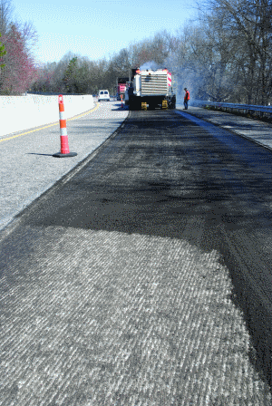 Fine milling provides super-smooth base for overlays while correcting cross-slope problems.