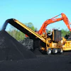Tear-off shingles and asphalt roads make excellent partners.