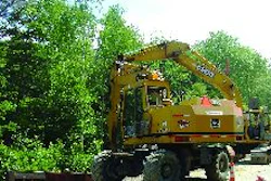 The Lane Construction Corp. uses wheeled excavators for added mobility and ease of travel.