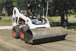 A vibratory roller attachment can be used for patch work and compaction of base material.