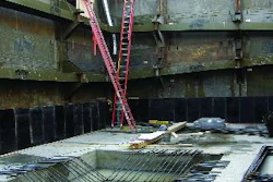 Efficiency's Universal Slide Rail is a component shoring system comprised of steel panels and vertical steel posts. It can be used in a variety of configurations, including the ClearSpan configuration shown.
