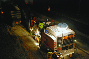 A balloon light and factory-equipped lighting system cuts darkness on I-57.