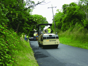 The crew had both Ingersoll Rand DD-90 and DD-90HF rollers on site. 'Breakdown was done at placement temperatures, roughly 250 degrees F. Finish rolling was done about 180 degrees F,' says Annette G. Smith, project leader at PQ Corp.