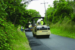 The crew had both Ingersoll Rand DD-90 and DD-90HF rollers on site. 'Breakdown was done at placement temperatures, roughly 250 degrees F. Finish rolling was done about 180 degrees F,' says Annette G. Smith, project leader at PQ Corp.