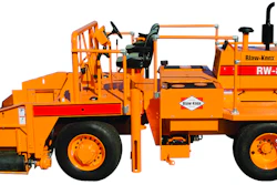 An 80-hp Cummins diesel powers the 10-ton, front-wheel-drive RW-80A road widener through a direct drive.