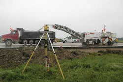 A Topcon Positioning Systems Millimeter GPS+ system utilizes satellite signals in conjunction with a PZL-1 Lazer Zone transmitter (shown here) and a PZS-MC machine-control sensor for precise grade control.