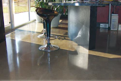 The office space at CONCRETEWORKS Design features polished floors, acid stained with densifiers and water-based finish coats.