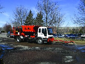 A one-man, self-contained spray injection patcher allows a contractor to properly repair a pothole without ever leaving the cab of the truck.
