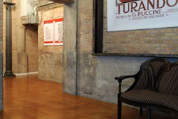 Instead of ripping out and replacing the 80-year-old concrete floor during the lobby renovation at the Opera Lofts condominiums, the general contractor chose a repair and wear topping system with a decorative finish.