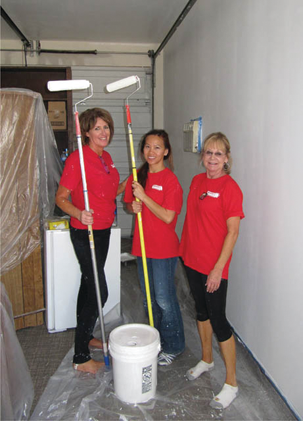 McCarthy Heart Hats perform painting improvements at the Veterans First housing complex.
