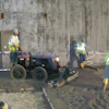 A Lindsay Lampasona crew uses a Somero Power Rake to verify subgrade tolerance before striking off a 20,000-square-foot floor at a Walmart in North Smithfield, R.I.