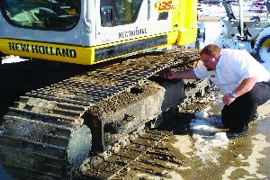 Take the time to inspect and maintain excavator undercarriages and you'll get longer machine life.