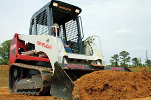 A compact track loader with a standard bucket can do a decent job of grading as long as you fill the bucket with dirt to help balance the machine.
