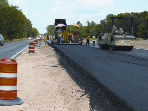 The project included approximately 115,000 cubic yards of earthwork, placement of graded aggregate base course, placement of over 77,000 tons of base, binder and surface asphalt.