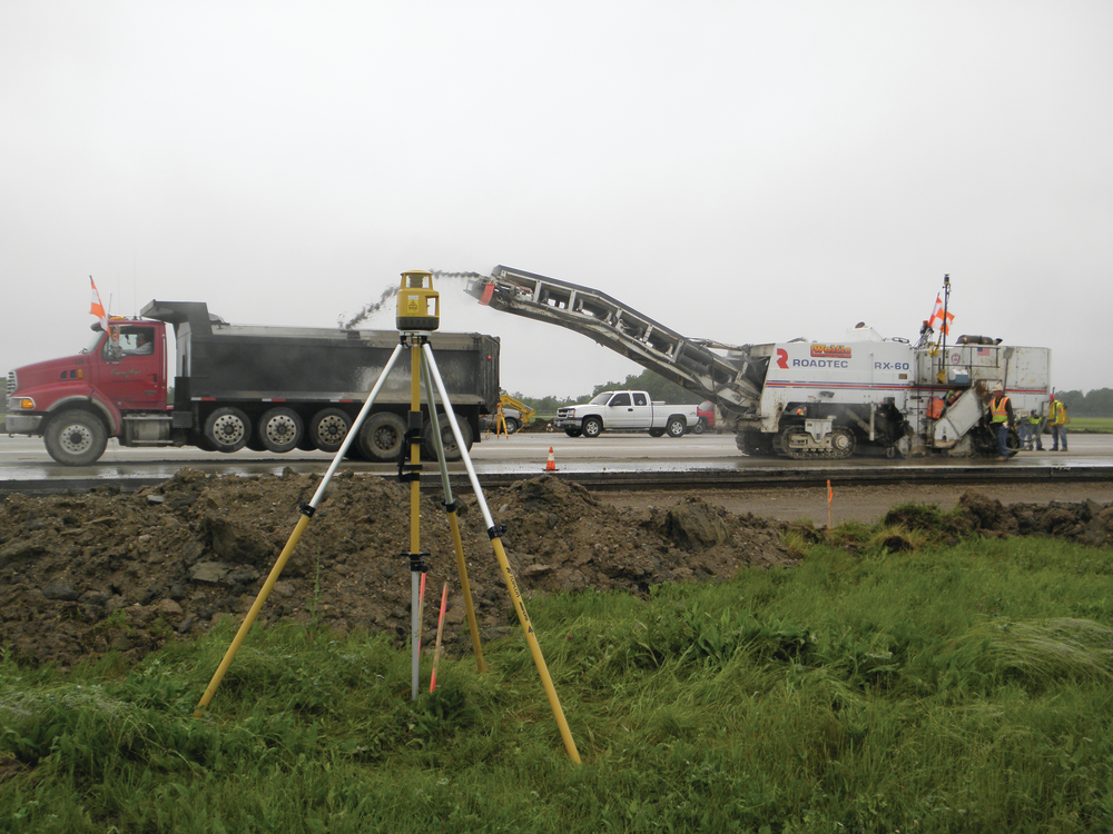 A Topcon Positioning Systems Millimeter GPS+ system utilizes satellite signals in conjunction with a PZL-1 Lazer Zone transmitter (shown here) and a PZS-MC machine-control sensor for precise grade control.