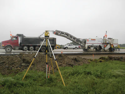 A Topcon Positioning Systems Millimeter GPS+ system utilizes satellite signals in conjunction with a PZL-1 Lazer Zone transmitter (shown here) and a PZS-MC machine-control sensor for precise grade control.