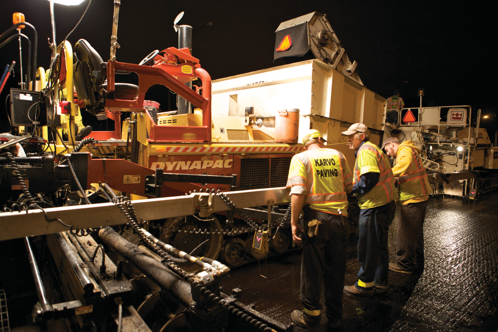 Karvo outfitted the paver with the optional power tunnels to help control material distribution at wider widths.