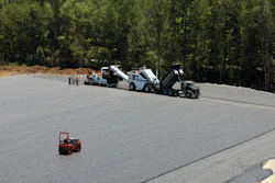 The asphalt was applied in two 4-inch lifts of AS binder containing 10% RAP. The layers were capped with 1.25 inches of Open Graded Friction Course (OGFC) surrounded by riprap.