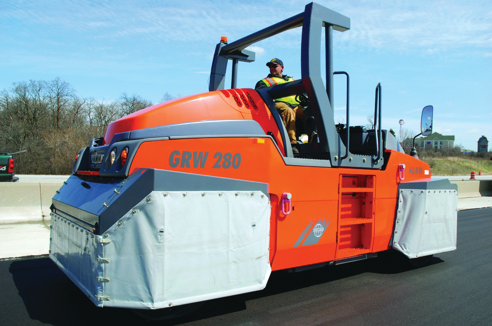 Accessories, like heat skirts, can be used to keep the tires hot to prevent material pickup.