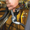 The proper connector tightened to the appropriate torque value helps prevent leaks.