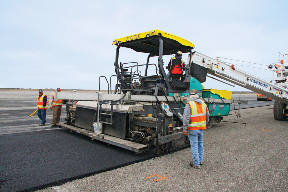 The paver was fitted with a Big MultiPlex Ski for grade and slope control.