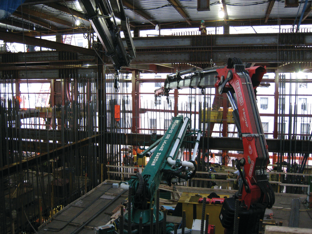 Once the steel rebar was distributed on each floor, the Fassi F800XP would hold the rebar in place for the concrete team.