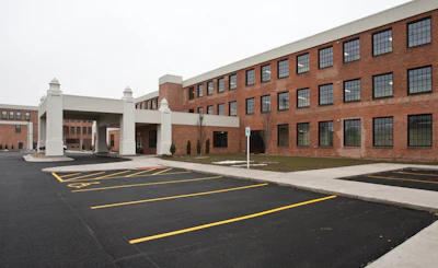Bush Construction helped to transform a brownfield area in downtown Rock Island, IL, into this attractive 30-unit apartment complex.