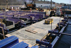 The pier is constructed of a complex honeycombed cast-in-place concrete substructure of pile caps, duct banks and mechanical chases and will be topped with a cast-in-place concrete deck.