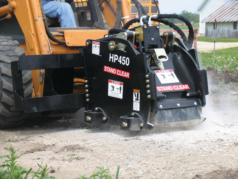Cold planers, such as this Bradco unit, are used for asphalt and concrete pothole and frost heave repair, curb cutting, pavement texturing and the removal of traffic lane stripes and roadway around manholes.