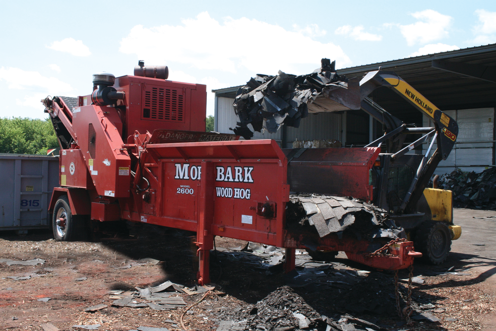 Charles Copley Roofing’s Morbark grinder processes material down to a 1 ½-inch product.