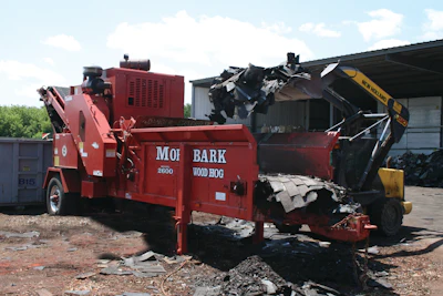 Charles Copley Roofing’s Morbark grinder processes material down to a 1 ½-inch product.