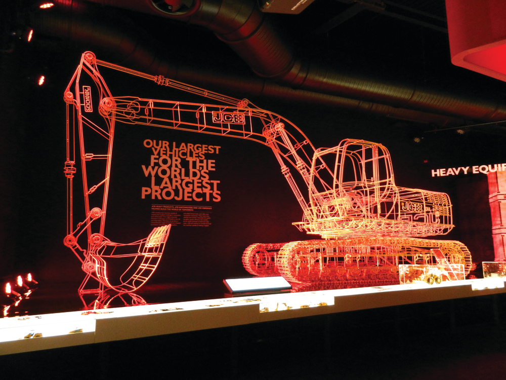 The centerpiece of the exhibition is a giant skeletal model of a JCB JS200 tracked excavator built to scale out of 8mm steel rod and created by artist Benedict Radcliffe.