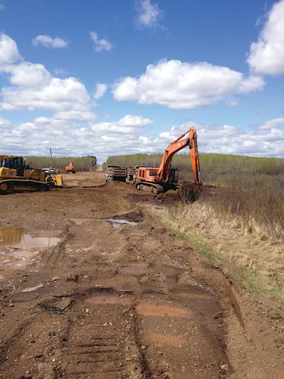 RJS has expanded its use of automated grade control to include its fleet of dozers and a Hitachi excavator.
