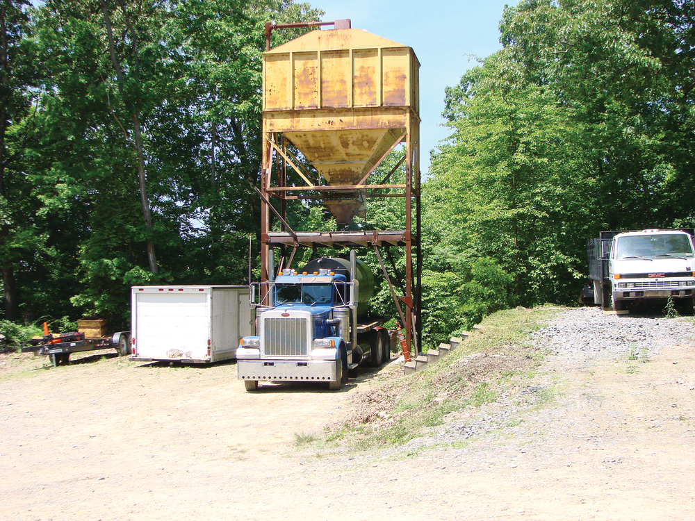 “We used to have six guys shouldering bags of sand,” Dan Miller says. “It took a long time and wasn’t safe.”