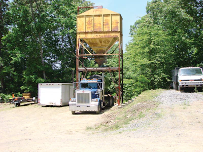 “We used to have six guys shouldering bags of sand,” Dan Miller says. “It took a long time and wasn’t safe.”