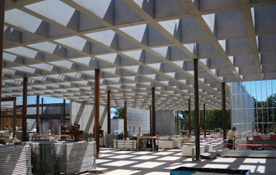The concrete coffered ceiling at the St. Louis Art Museum was formed with more than 1,600 cubic yards of concrete poured in place to form a 48-inch-tall framework with 698 rectangular openings that let in light from above.
