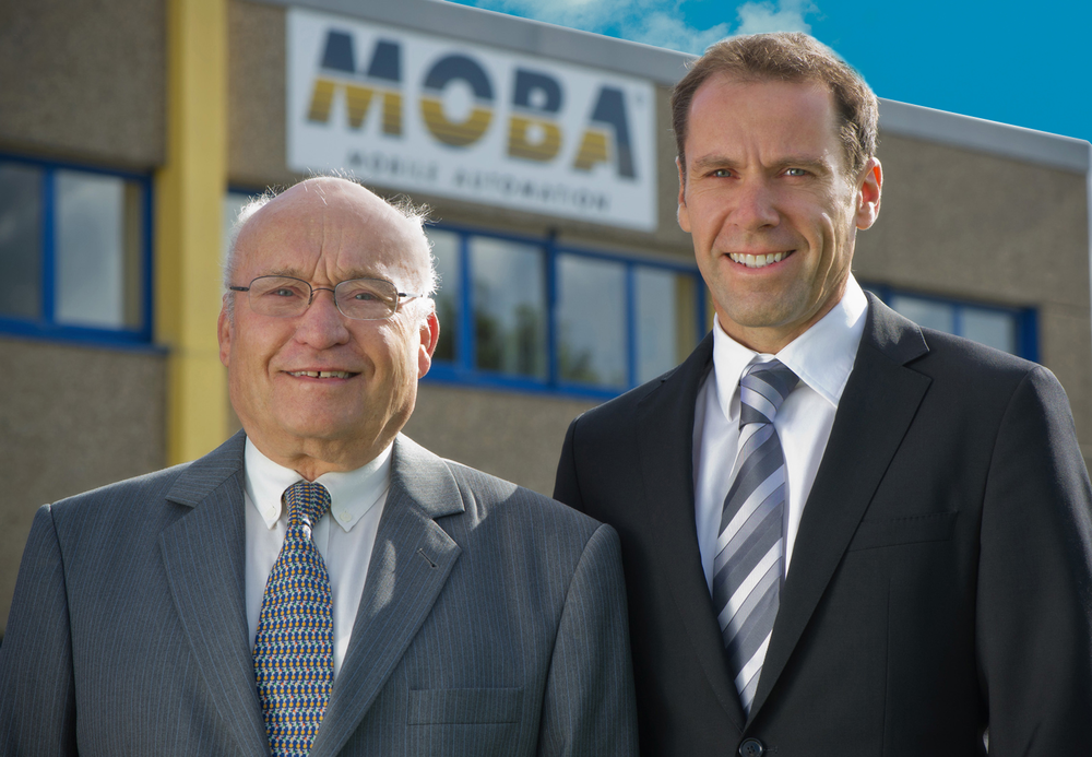 MOBA founder, Paul Harms (left), with his son, Volker Harms, CEO, who took over management of the company in 2004.
