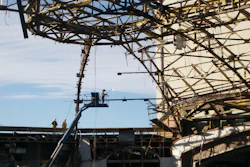 The dome's roofing materials - a compilation of over 16 inches of lightweight concrete, foam insulation, built-up roofing material and thin copper sheeting - were removed manually.