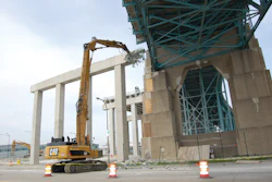 Adamo Group used an Apex 70 Ultra High Demolition Hydraulic Excavator to remove a 65-foot-tall pier located within a few feet of Detroit's Ambassador Bridge.
