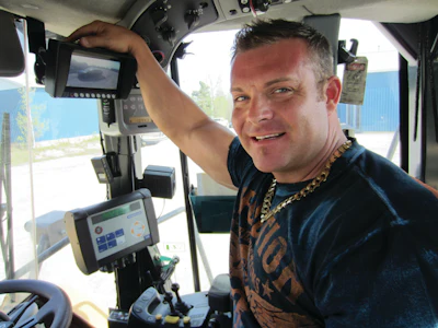 David Pyper appreciates the TRACK-VISION backup camera system in his CAT loader.