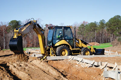The Caterpillar F Series models feature an electronically controlled piston pump that automatically optimizes performance for specific operations, ensuring loader power management and backhoe productivity.