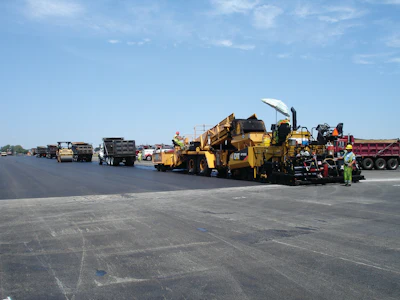 To help assure non-stop paving, the crew waited until at least three trucks were in front of the paver before starting each pull.