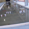 The penetrations required in this depressed area in an elevated floor slab make it difficult to use 10-foot straightedges and riding power trowels. Specifiers should consider these multiple obstructions to finishing operations when determining F-number values. In this case, the specifier required F-numbers in the small depressed floated area that was to receive ceramic tile for bathrooms.