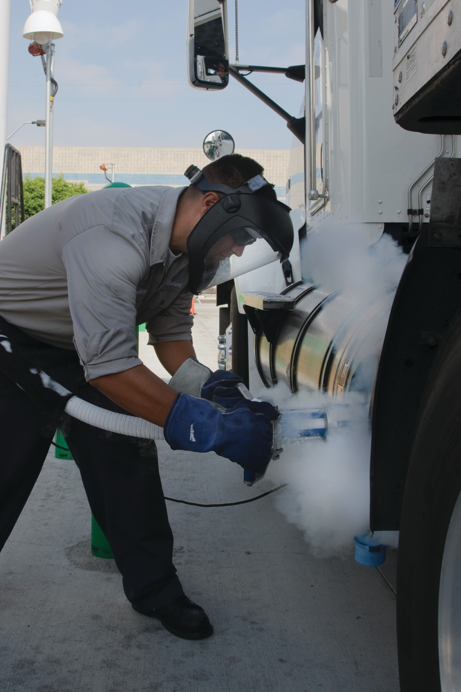 Refueling an LNG storage tank on a class 8 heavy-duty truck.