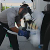 Refueling an LNG storage tank on a class 8 heavy-duty truck.