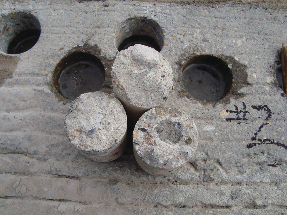 In-place concrete strengths represented by cores are typically less than lab-cured cylinder strengths due to field factors like consolidation and curing.