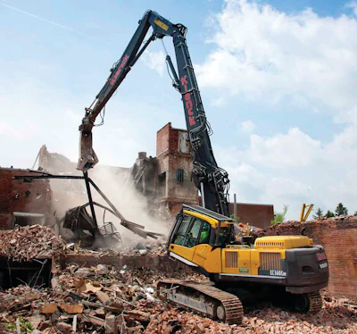 The Volvo EC360C High-Reach excavator had a 69-ft. boom with a multi-processor that crunched the concrete and brick structure with the front part of the jaws and cut through metal in the rear of the jaws.
