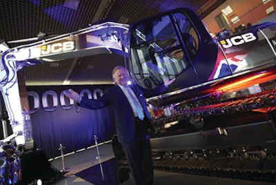 JCB Chairman Sir Anthony Bamford pictured with the one millionth machine produced by the company.