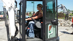 New Assistant Editor Jessica Stoikes operates an E26 Excavator at the Bobcat Attachments Boot Camp in Fargo, ND