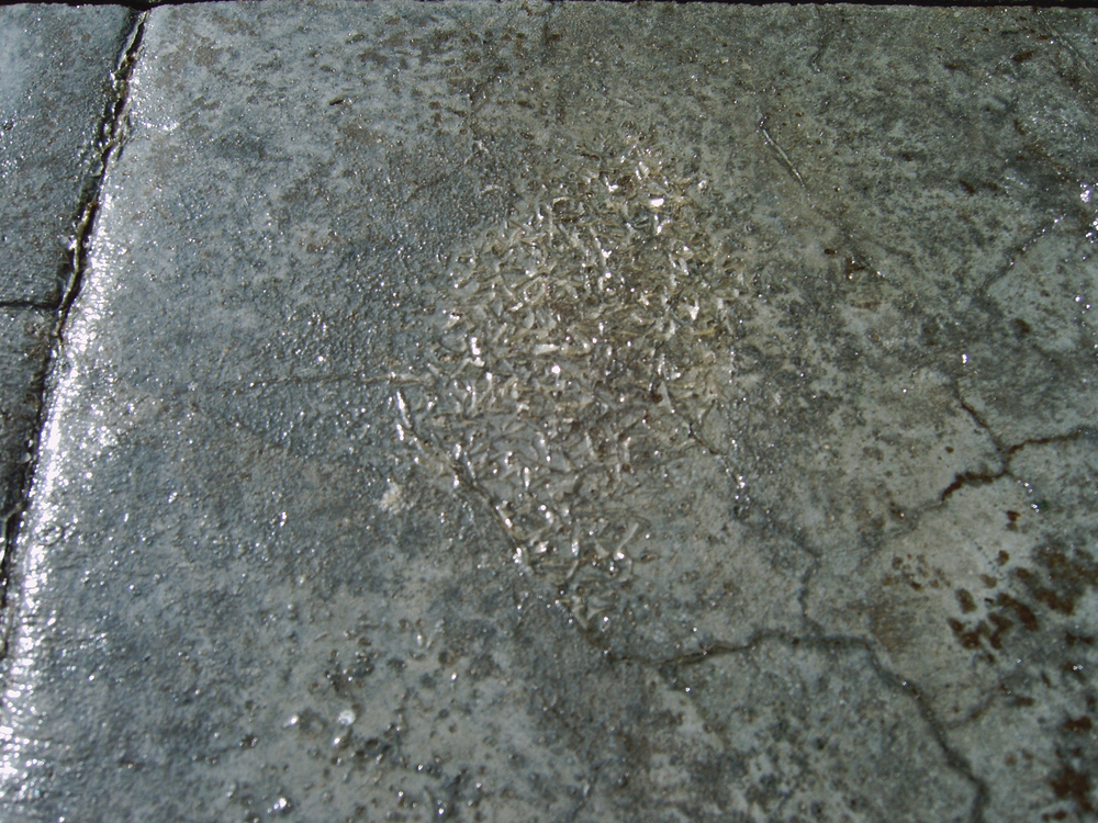This sealer was over applied. It should have been applied 1 to 2 mils thick, but was likely 20 to 30 mils thick.